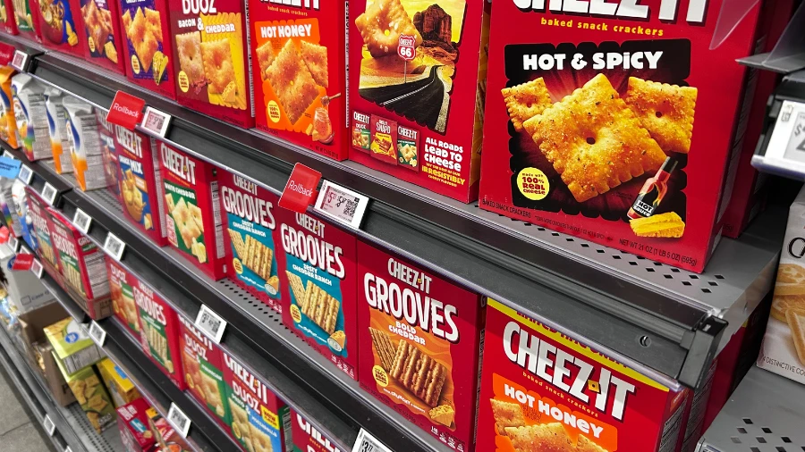 Electronic shelf labels installed on supermarket gondola shelving with wireless access point mounted overhead - real retail ESL deployment Electronic shelf labels installed on supermarket gondola shelving with wireless access point mounted overhead - real retail ESL deployment